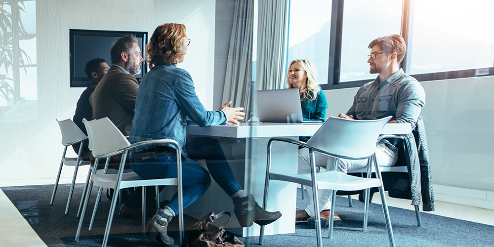 co-workers at a conference table