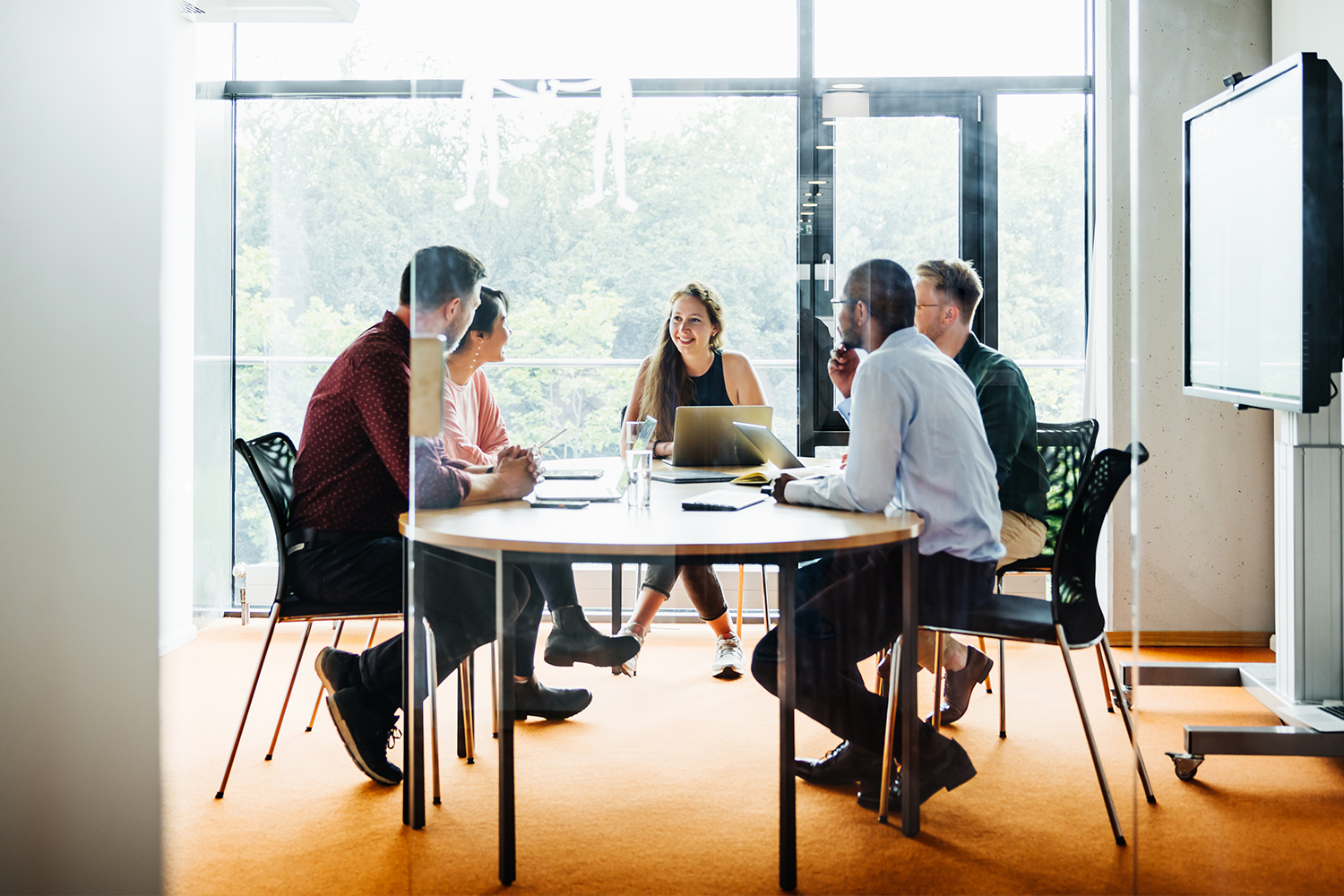 co-workers at  conference table